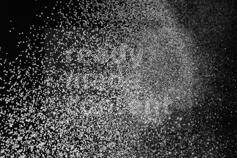Snow spray on black background