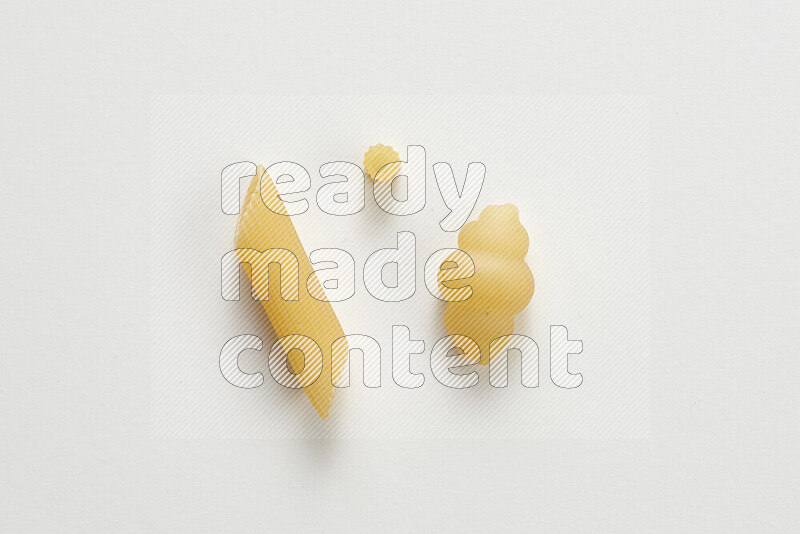 Different pasta types on white background