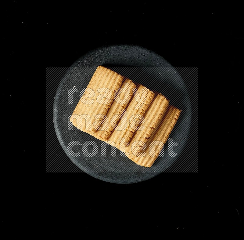 Top View of Plain Tea Biscuits Cookies on Black Flooring
