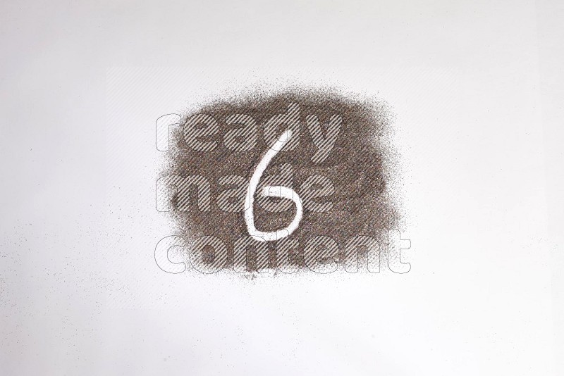Numbers written with glitter on white background