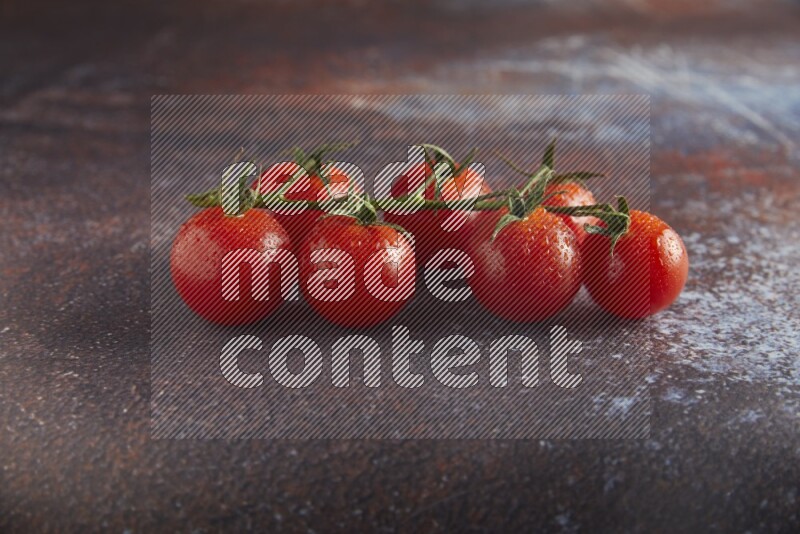 red cherry tomato vein on a reddish rustic metal background 45 degree