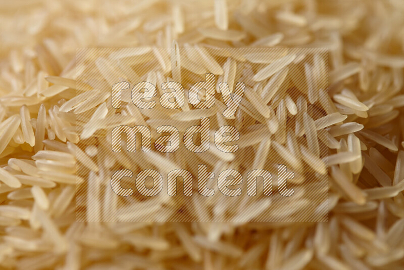 Basmati golden rice on white background
