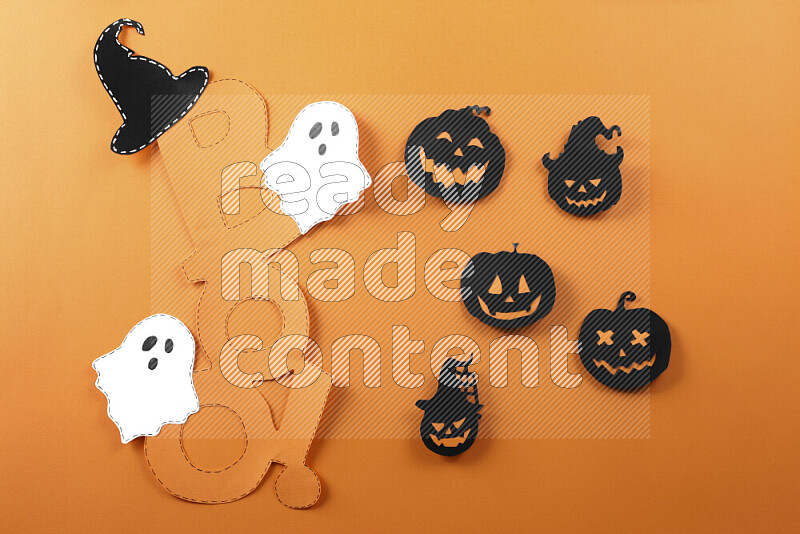 Halloween hand crafts on orange background