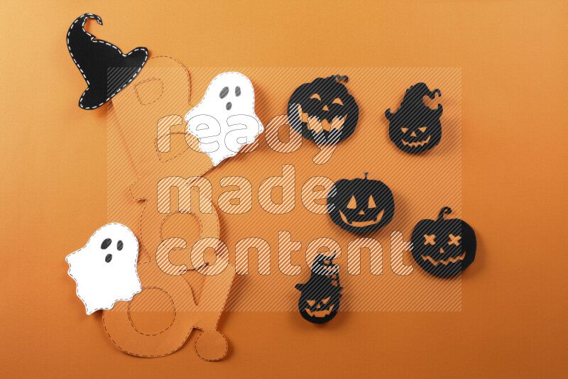 Halloween hand crafts on orange background