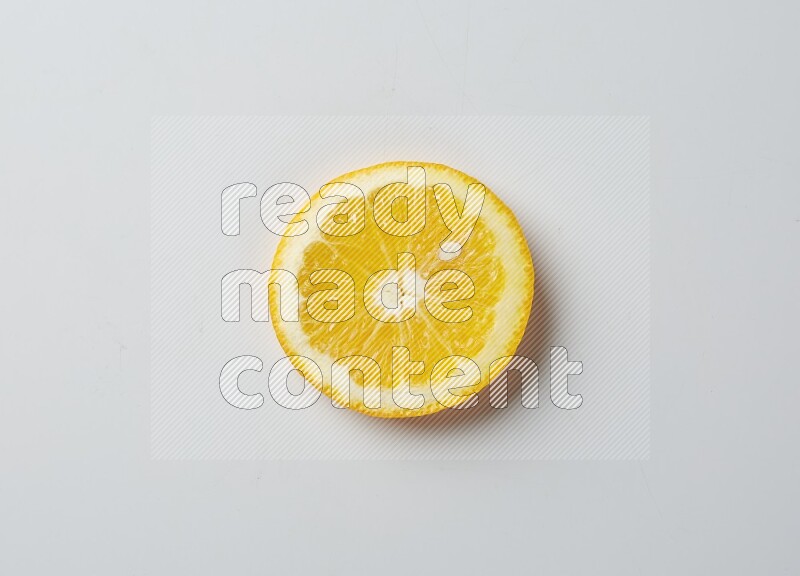 A Single orange slice on white background