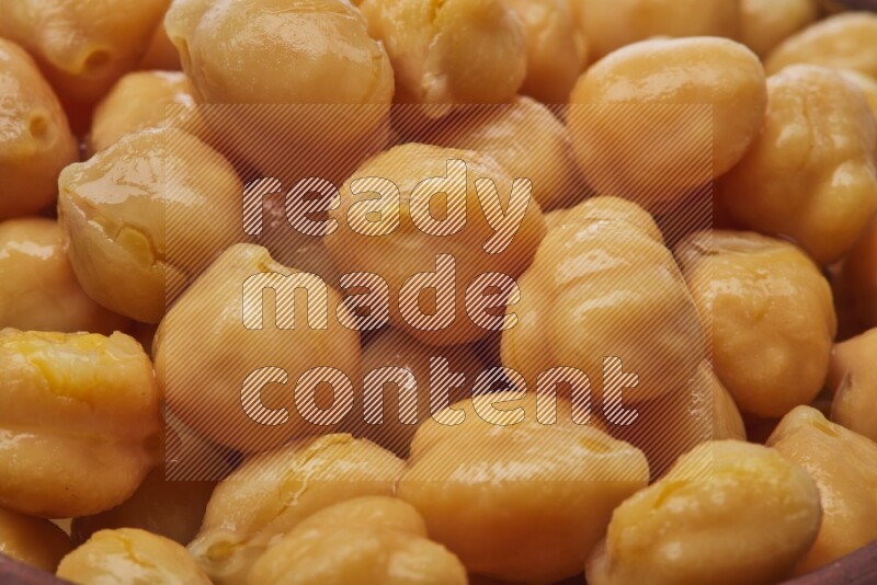 Close up shot of boiled chickpeas on white background