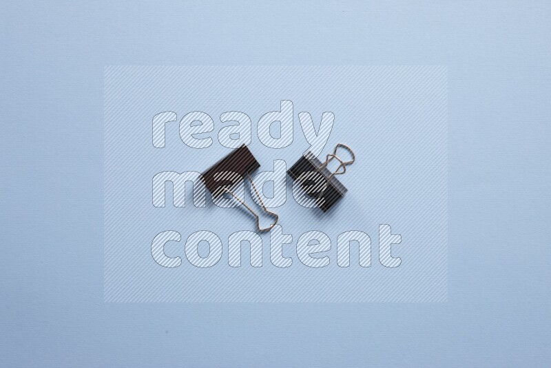 Different school supplies on blue background