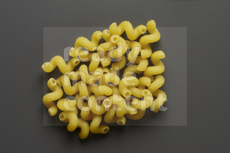 Twist pasta on grey background