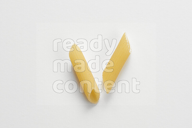 Penne pasta on white background