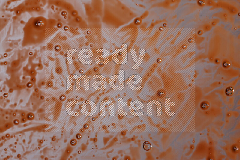 Close-ups of abstract orange paint texture in different shapes