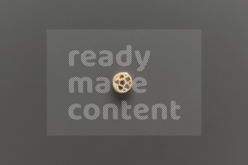 Shaped children pasta on grey background