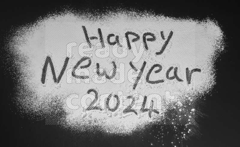 A sentence written with powder on black background