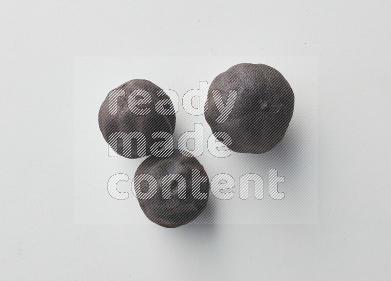 Top-view shot of dried lime (loomi) on white background