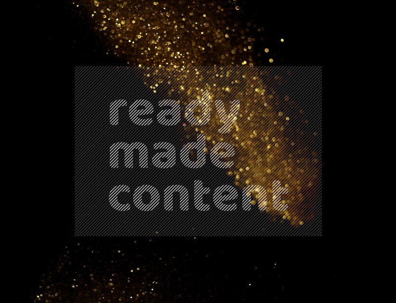 Gold glitter powder isolated on black background