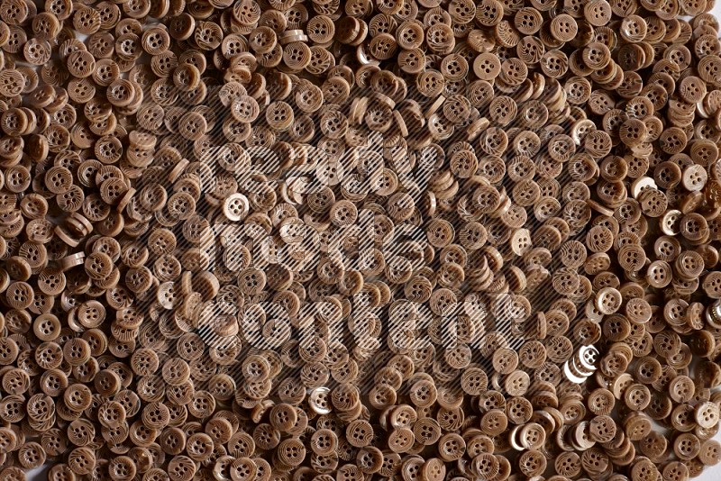 Brown buttons on grey background