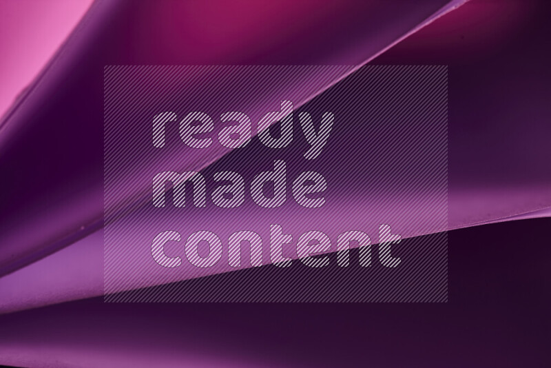 An abstract art piece displaying smooth curves in warm and cold gradients created by colored light