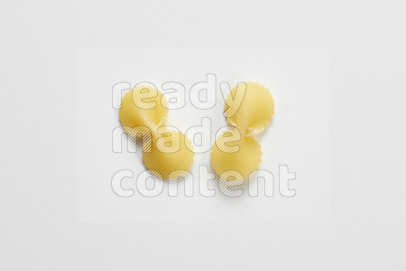 Fiocchi pasta on white background