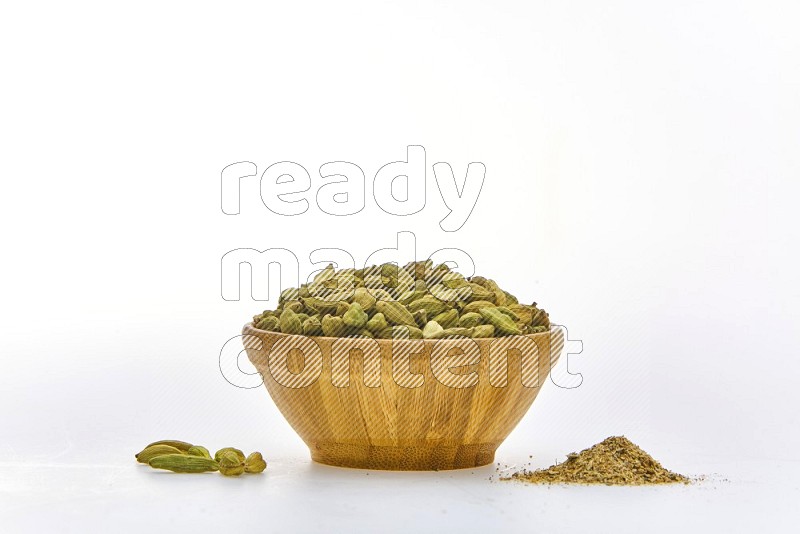 Cardamon in a container on white background