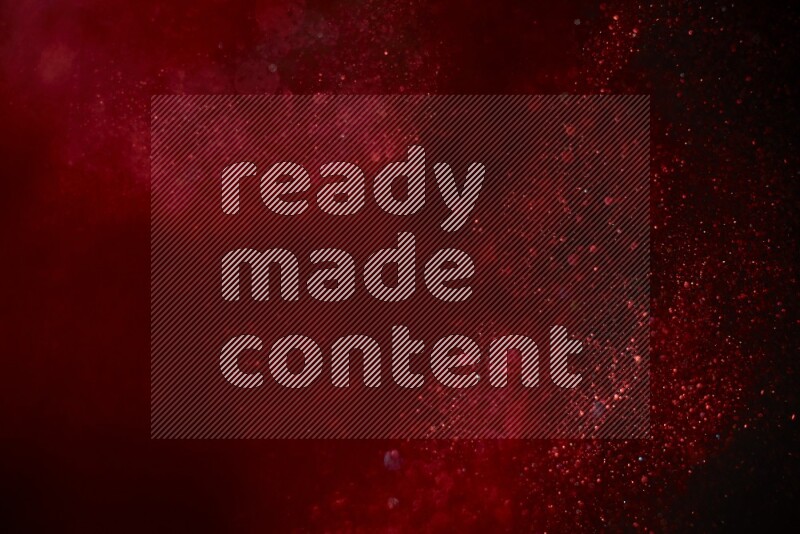 Red glitter powder isolated on black background