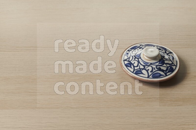 Multicolored Pottery Pot on Oak Wooden Flooring, 45 degrees