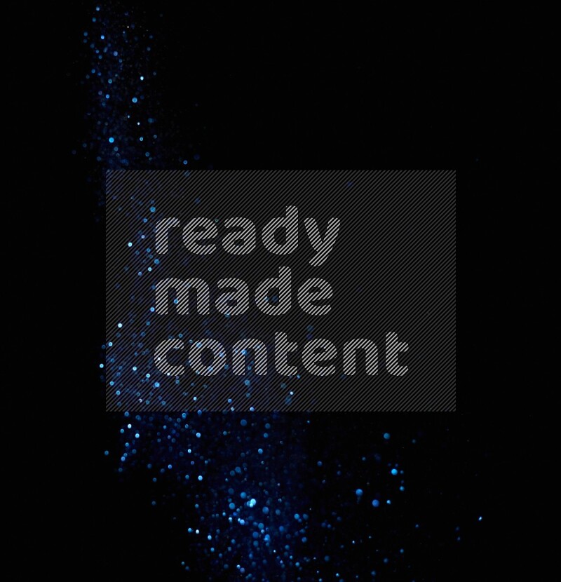 Blue glitter powder isolated on black background