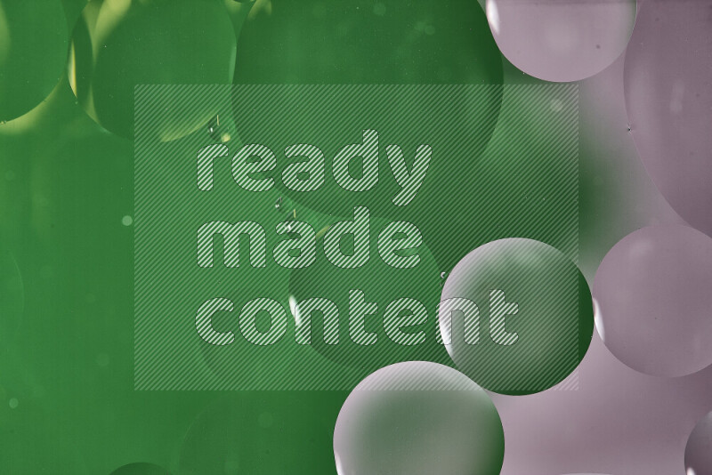 Close-ups of abstract oil bubbles on water surface in shades of white and green