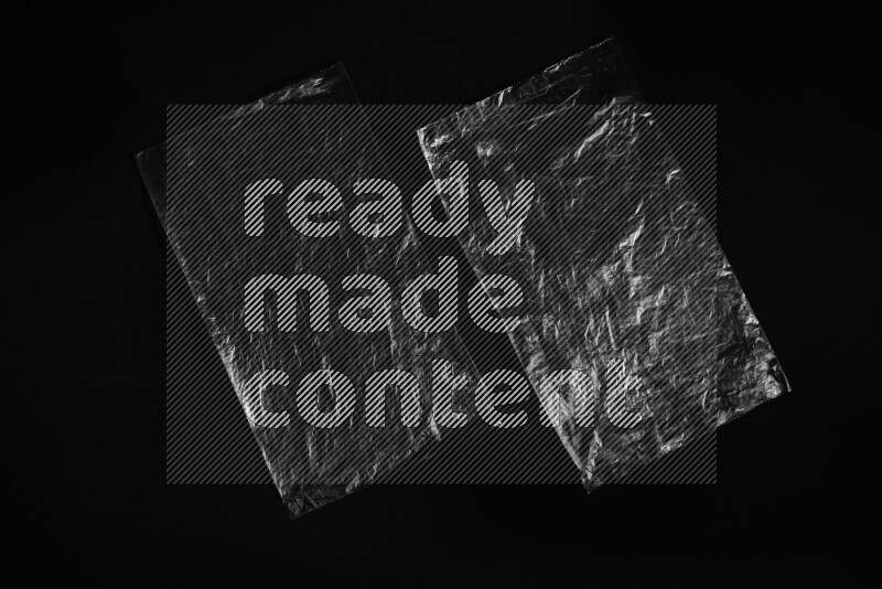 Transparent plastic textures on black background