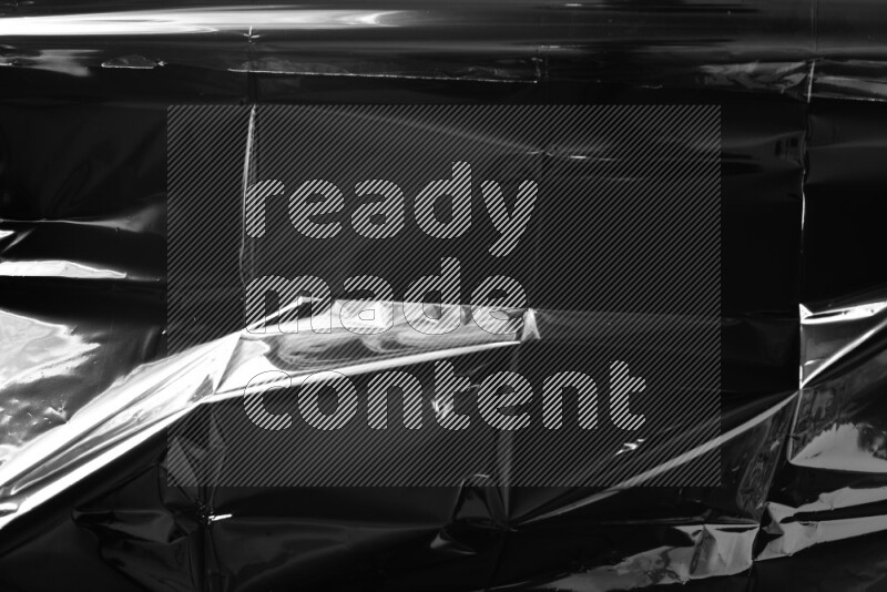Plastic wrap texture on black background
