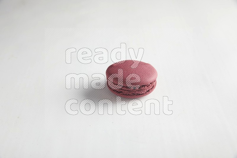 45º Shot of Red Cherry macaron on white background