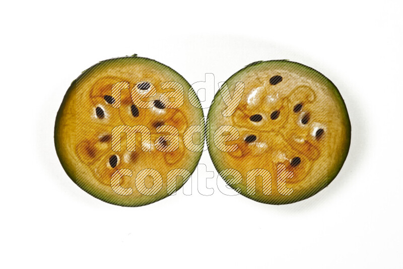 Watermelon slices on illuminated white background