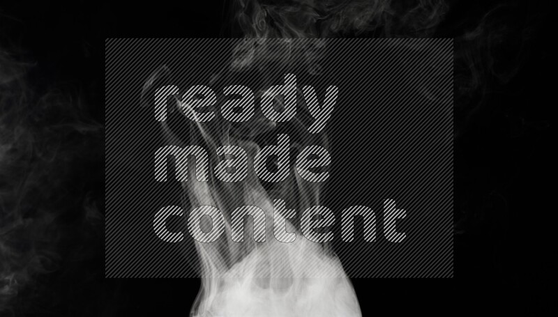 irregular white smoke on black background.