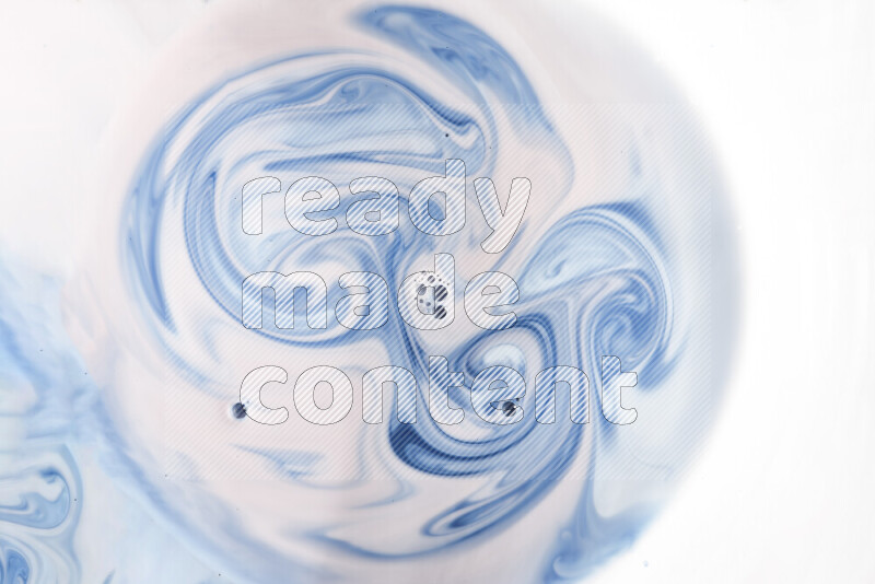 A close-up of abstract swirling patterns in blue and white