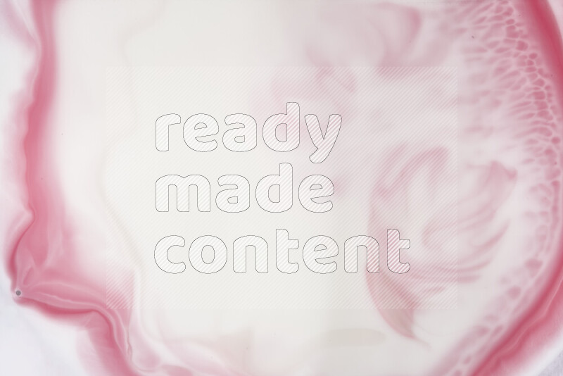 A close-up of abstract swirling patterns in red and white