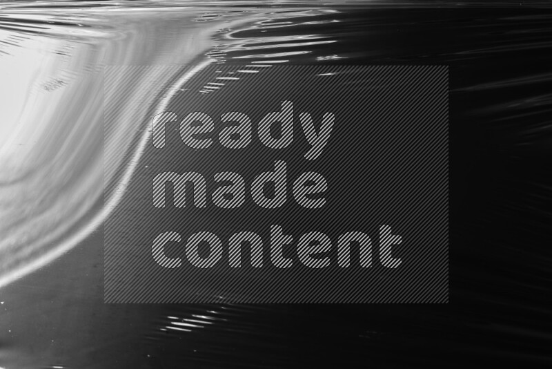 Plastic wrap texture on black background