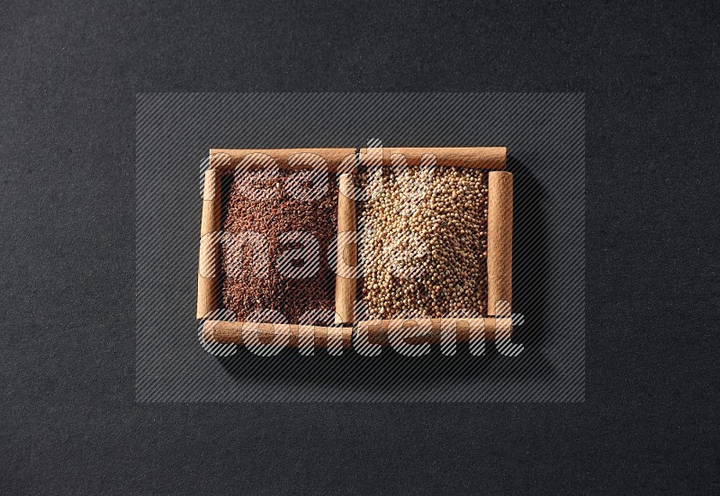 2 squares of cinnamon sticks full of mustard seeds and garden cress on black flooring