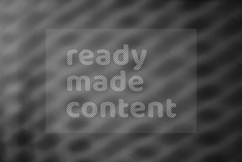 مجموعة من ضوء الغوبو الخافت تظهر أنماط هندسية علي سطح ناعم