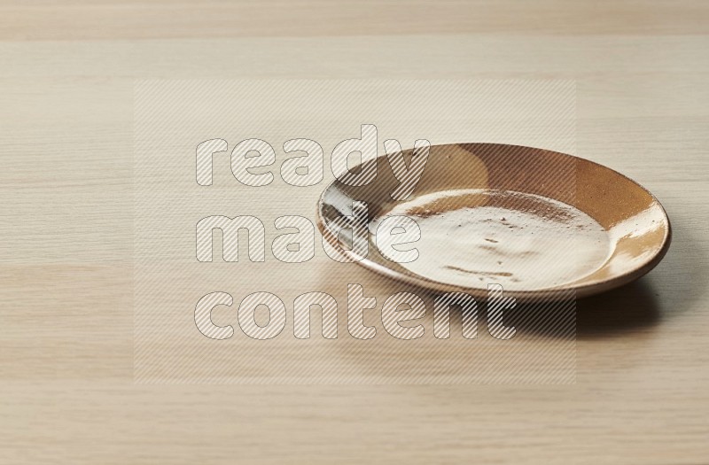 Multicolored Pottery Plate on Oak Wooden Flooring, 15 degrees