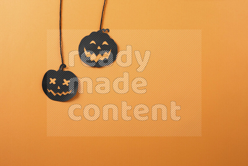 Halloween hand crafts on orange background