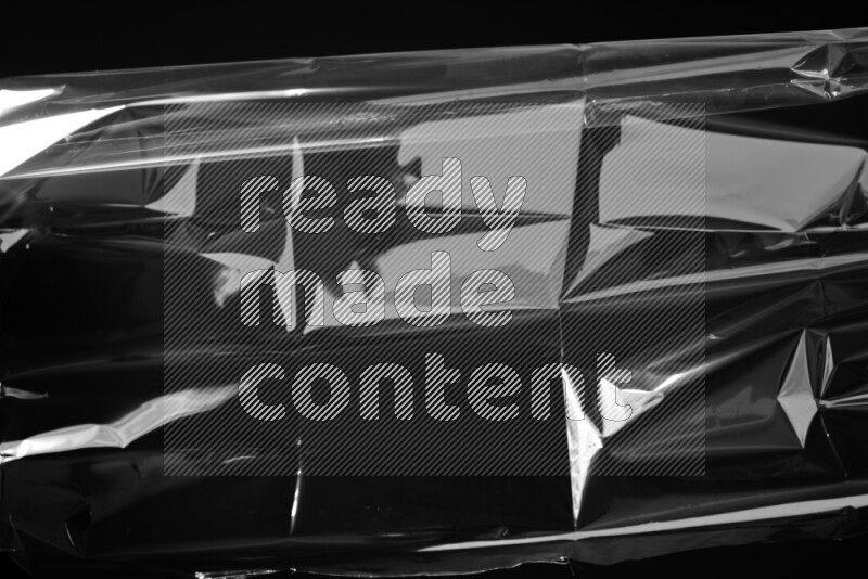 Plastic wrap texture on black background