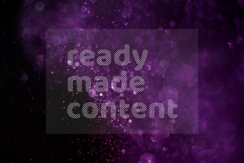Purple glitter powder isolated on black background
