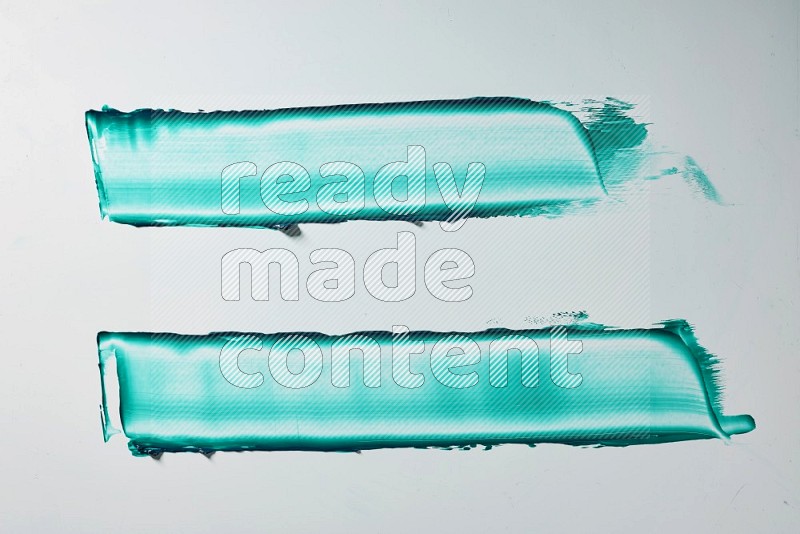 Turquoise painting knife strokes on white background