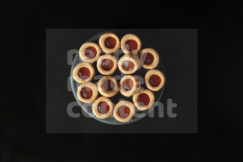 Jam cookies on a black background