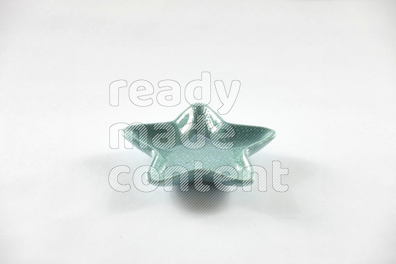 A pottery star plate on white background