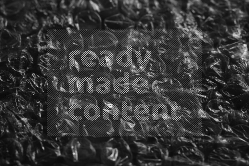 Bubble wrap texture on black background