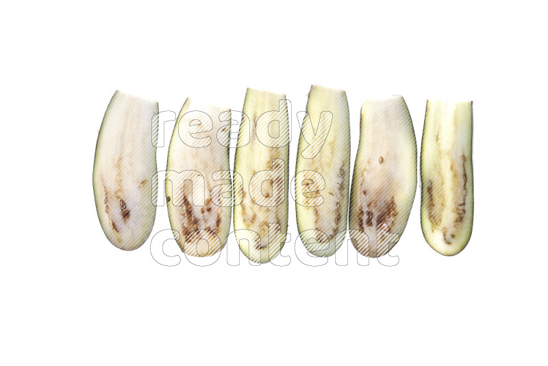Eggplant slices on illuminated white background
