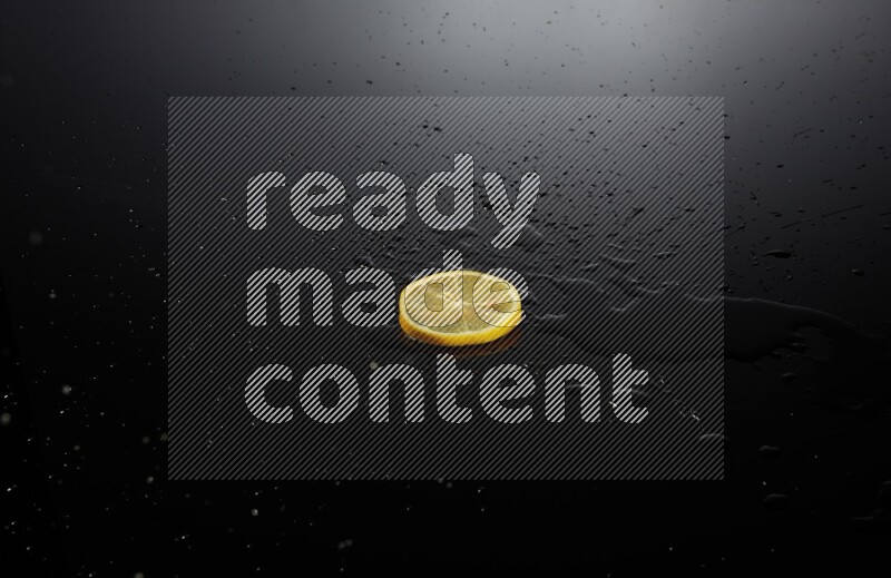 Lemon slice on black background