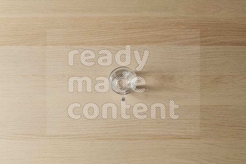 Top View Shot Of An Empty Glass on Oak Wooden Flooring