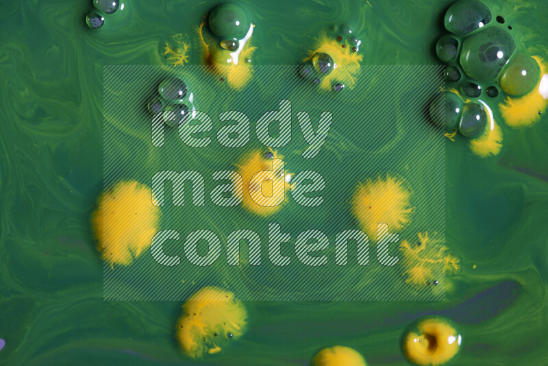 خلفية ملونة مع مزيج من ألوان الطلاء الأخضر والأصفر