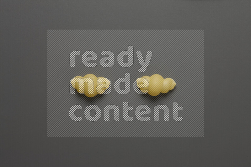 Snails pasta on grey background