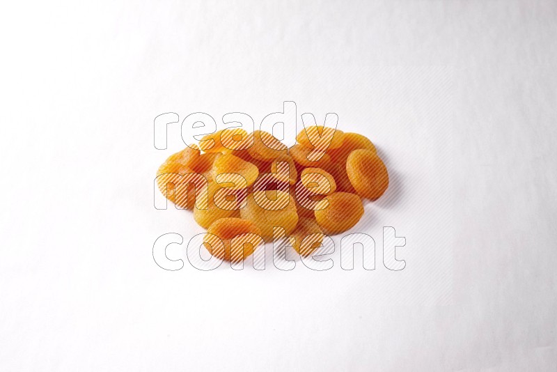 Dried apricots on white background